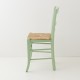 Chaise en paille vert jade de profil