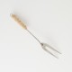 fourchette de service inox manche  bois vue de dessous