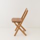 chaise pliante en bois vue de côté