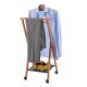 Valet de chambre pliant en bois en situation