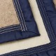 maxi plaid en laine sans teinture reversible bords bleu nuit détail de finition