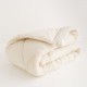 couette 4 saisons modulable en pure laine vierge artisanale